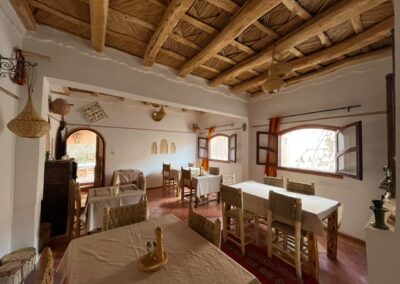 Dining room with wooden ceiling at Dar Essalama