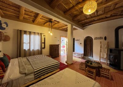 Bedroom with seating area and natural light