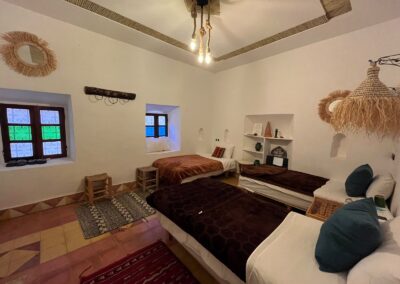 Bedroom with colorful cushions and traditional decor